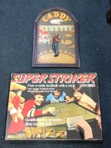 A 70s boxed Super Striker table football game by Parker Games with pitch board, goals, player