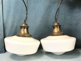 A pair of Edwardian milk glass plaffoniers of moulded bowl shape having waisted oxidised mounts with