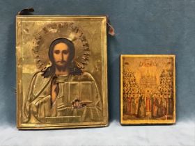 A 19th century Russian icon of Christ Pantocrator, oil on wood panel, with repoussé brass oklad