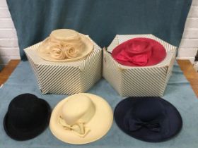 A Christys gents bowler hat; and four boxed ladies dress hats. (5)