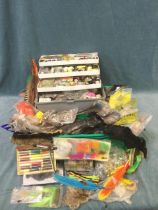 A quantity of fly tying materials including a vice, feathers, skins, hooks, cottons, tools, etc. (