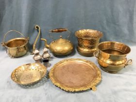 A Victorian copper-gilt salver with rococo chasing and foliate scrolled rim; a Victorian brass