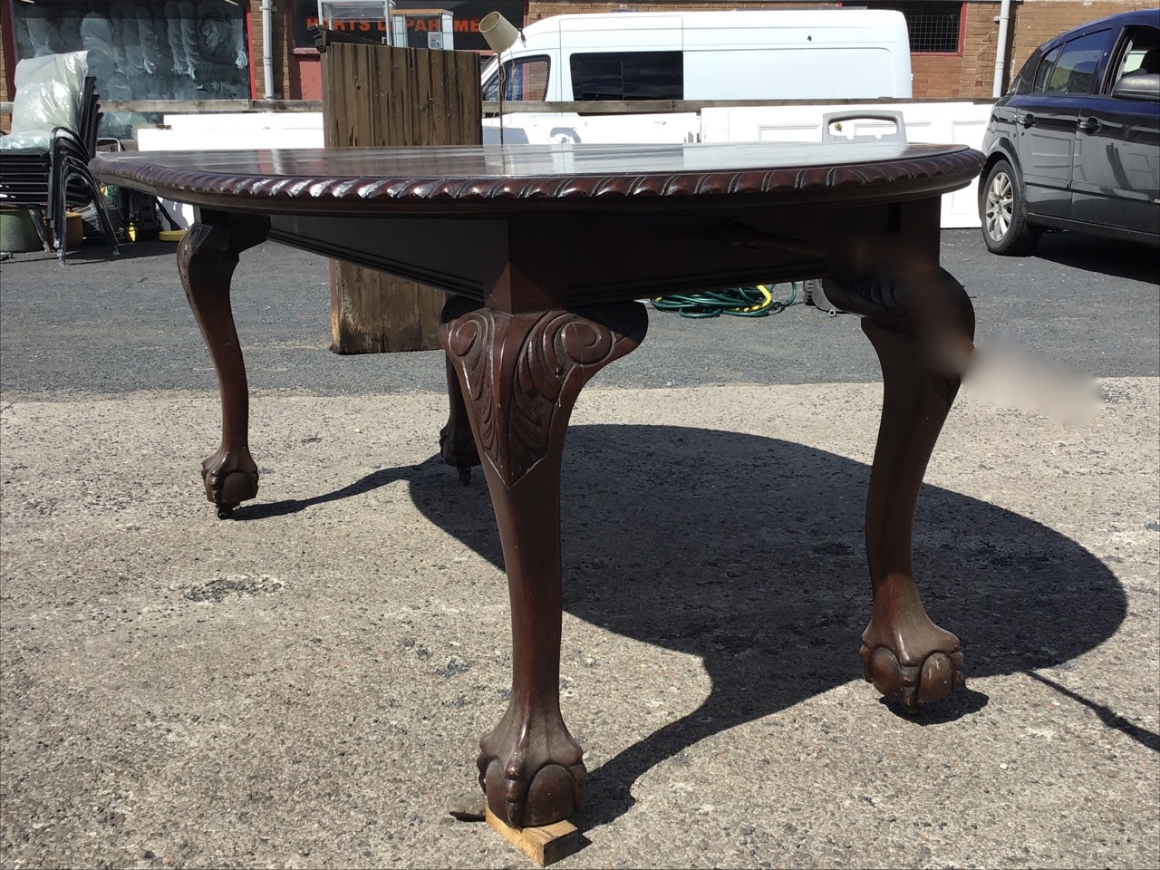 A late Victorian mahogany extending dining table with two leaves, the oval top with gadrooned edge - Image 3 of 3