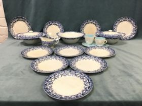 A Maling blue & white dinner service in the Leafy pattern including plates, tureens, a gravy boat,