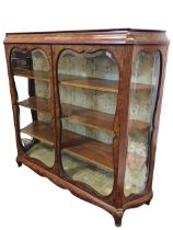 A Victorian satinwood marquetry display cabinet in the manner of Edwards & Roberts, the shaped ebony