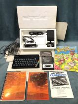 A 1982 boxed Sinclair ZX Spectrum 16k RAM personal computer, with 1983 Sinclair Programs magazine,