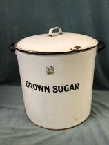 A large Victorian cylindrical enamelled brown sugar storage bin and cover. (24in x 20.5in x 24in)