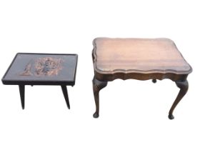A rectangular scalloped top coffee table with waved apron, raised on cabriole legs with shell carved