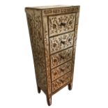 A contemporary mirrored cabinet of five drawers, with painted gilt scrolled decoration to panels,