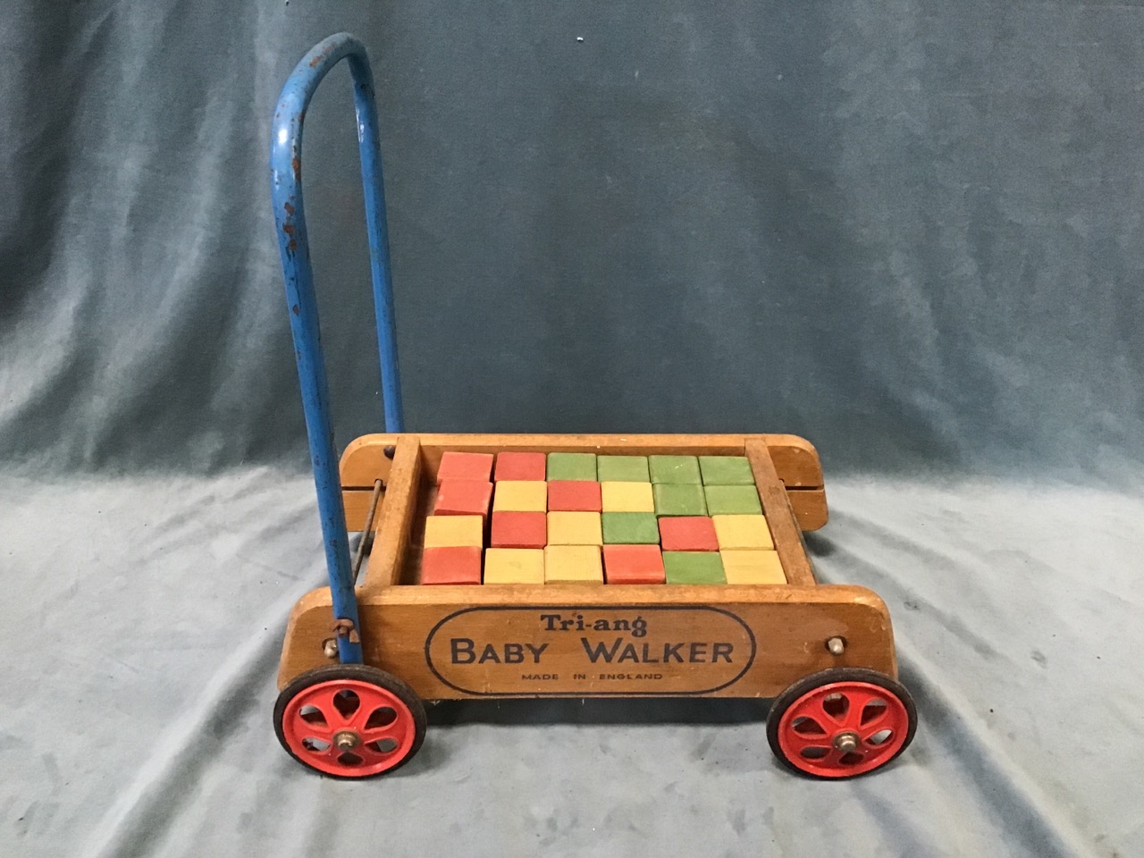 A childs ladderback chair with trefoil pieced rails above a formerly rushed seat; and a Triang - Image 3 of 3