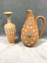 A Doulton Lambeth Silicon Ware jug with applied floral medallions to body - impressed mark and dated