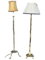 A square Edwardian brass standard lamp, the telescopic column on moulded base with art nouveau style