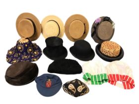 Two boxes of hats - boaters, chef type, straw, astrakhan, a top hat, a bowler, etc. (14)