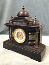 A Belgian slate architectural mantel clock, the triple domed case with brass finials and cast