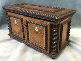 A C19th continental walnut tea caddy, the rectangular top with applied ebony mouldings and scrolling