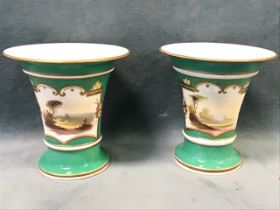 A pair of nineteenth century Coalport vases of flared shape with beaded bands, painted with
