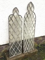 Two gothic shaped leaded glass window panels with lozenge shaped quarries to panels. (15in x