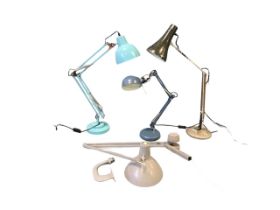 A 1970s Anglepoise desk lamp; a German draughtsmans counterweighted anglepoise style lamp; and two