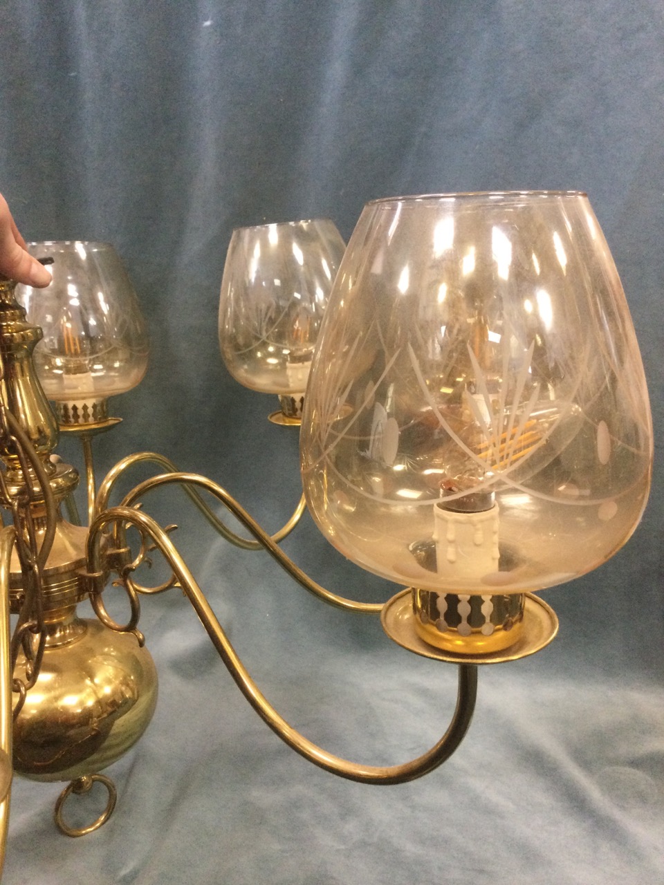 A large Dutch style brass chandelier with eight scrolled branches supporting candlelights and etched - Image 2 of 3