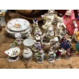 A group of 19th and 20th century continental porcelain figures, tea wares and vases, including Dresd