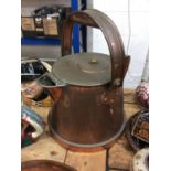 Large copper riveted jug with swing handle, a copper and brass pan, and a plated dish (3)