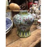 An 18th century polychrome delft ware vase, decorated in the Chinese style, and a 19th century salt