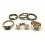 Two 9ct gold dress rings, three eternity rings and pair of cultured pearl stud earrings