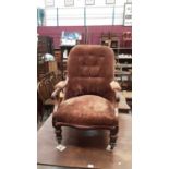 Victorian mahogany buttoned back easy chair with brown velvet upholstery on turned legs
