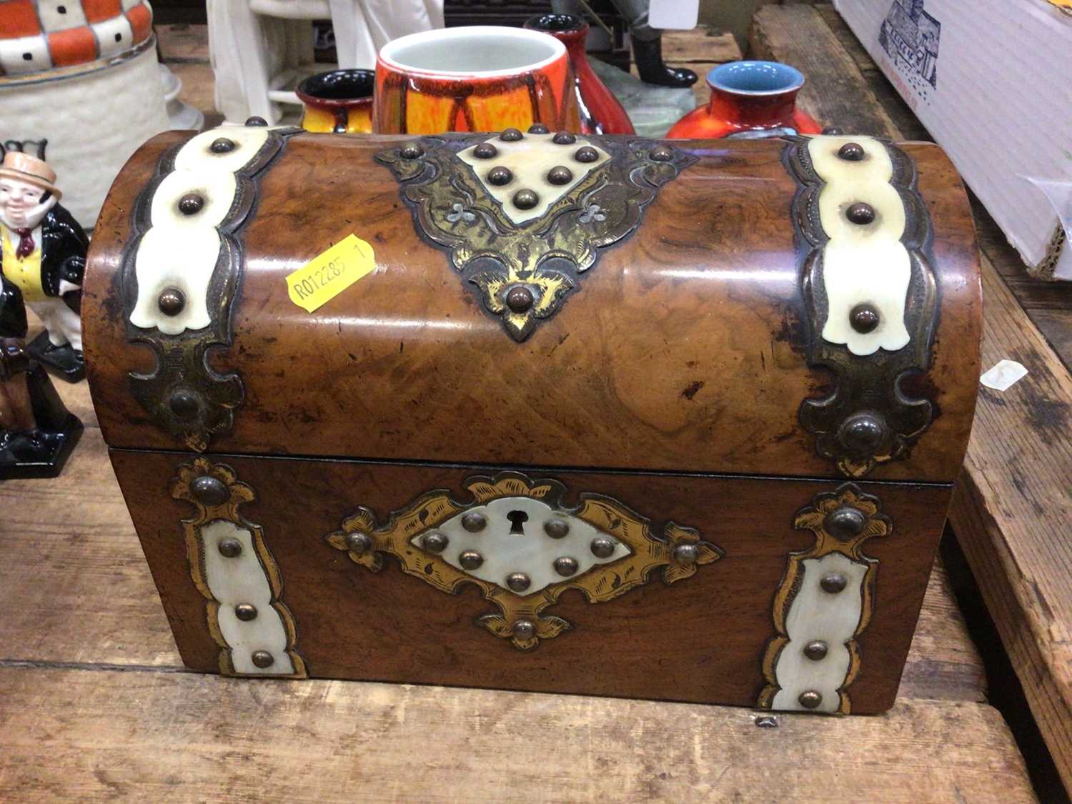 Victorian Gothic walnut dome topped tea caddy, with ivory and engraved gilt metal mounts. The hinged