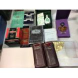 Collection of vintage and other boxed perfumes including Cartier, YSL, Ralph Lauren, Guerlain etc