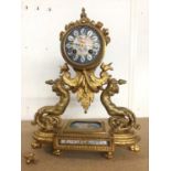 19th century French ormolu clock with painted porcelain panels and figure decoration