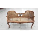 Antique French-style bergere salon sofa/window seat with carved and gilded beech frame
