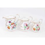 Three graduated Staffordshire porcelain jugs named and dated 1856.