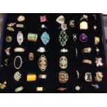 Collection of gem set dress rings in case