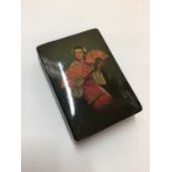 Russian lacquered snuff box, hand painted with a girl holding fans, signed and dated