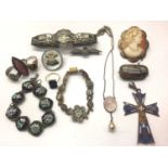 Collection of vintage costume jewellery including an RAF Officer's silver sweetheart brooch and
