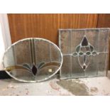 Two stained glass window panels