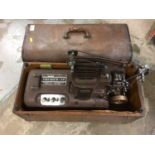 Vintage Ampro film projector and film (two cases)