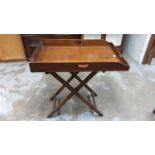 Victorian mahogany butlers tray on folding stand. The tray 81 x 55 cm
