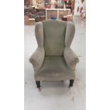 Edwardian wing back arm chair on ring turned legs