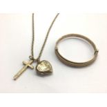9ct gold child's bangle and a 9ct gold chain with heart locket and cross pendant