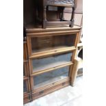 Early 20th century oak three tier Globe Wernicke bookcase with drawer below, 87cm wide, 31cm deep, 1