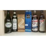 Eleven bottles of various alcohol to include Harveys Bristol Cream, Baileys, Gilbey's London Dry Gin