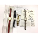 Four ladies wristwatches including Swatch, Tissot and Raymond Weil