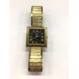 1970s Longines gold plated automatic wristwatch with black square dial and Roman numeral markers