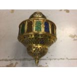 Indian style pierced brass pendent lantern with coloured glass panel and a pair of matching wall lig