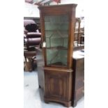 Georgian style mahogany corner cabinet with adjustable shelves enclosed by astragal glazed door, wit