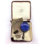 Pair of textured silver cufflinks, together with a silver and blue enamel miniature hand mirror