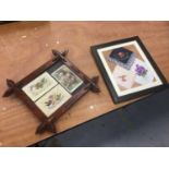 First World War silk embroidered handkerchiefs in glazed frame and First World War postcards in tram