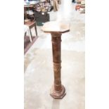 An Italian stone column stand with rotating square top